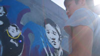 Andy Huang creates the Underpass mural